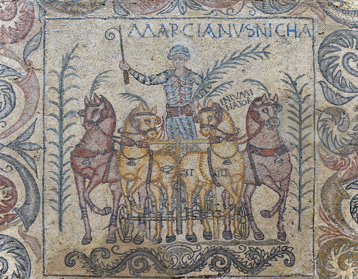 Roman mosaic depicting charioteer Marcianus commanding a quadriga -- four horses pulling a chariot in formation